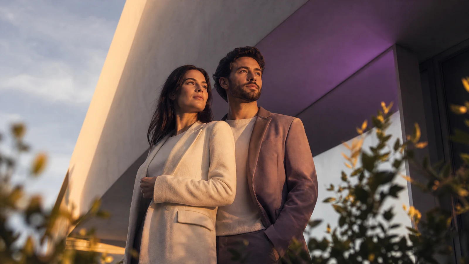 Couple portrait in golden late-afternoon light with a slow camera push-in